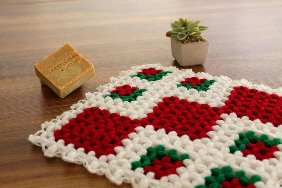 Handmade red and white crochet bath loofah – a soft, durable, and exfoliating scrubber